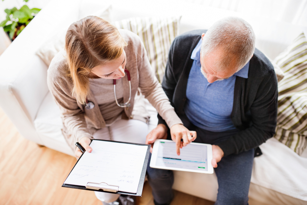 Image of medical professional helping a patient