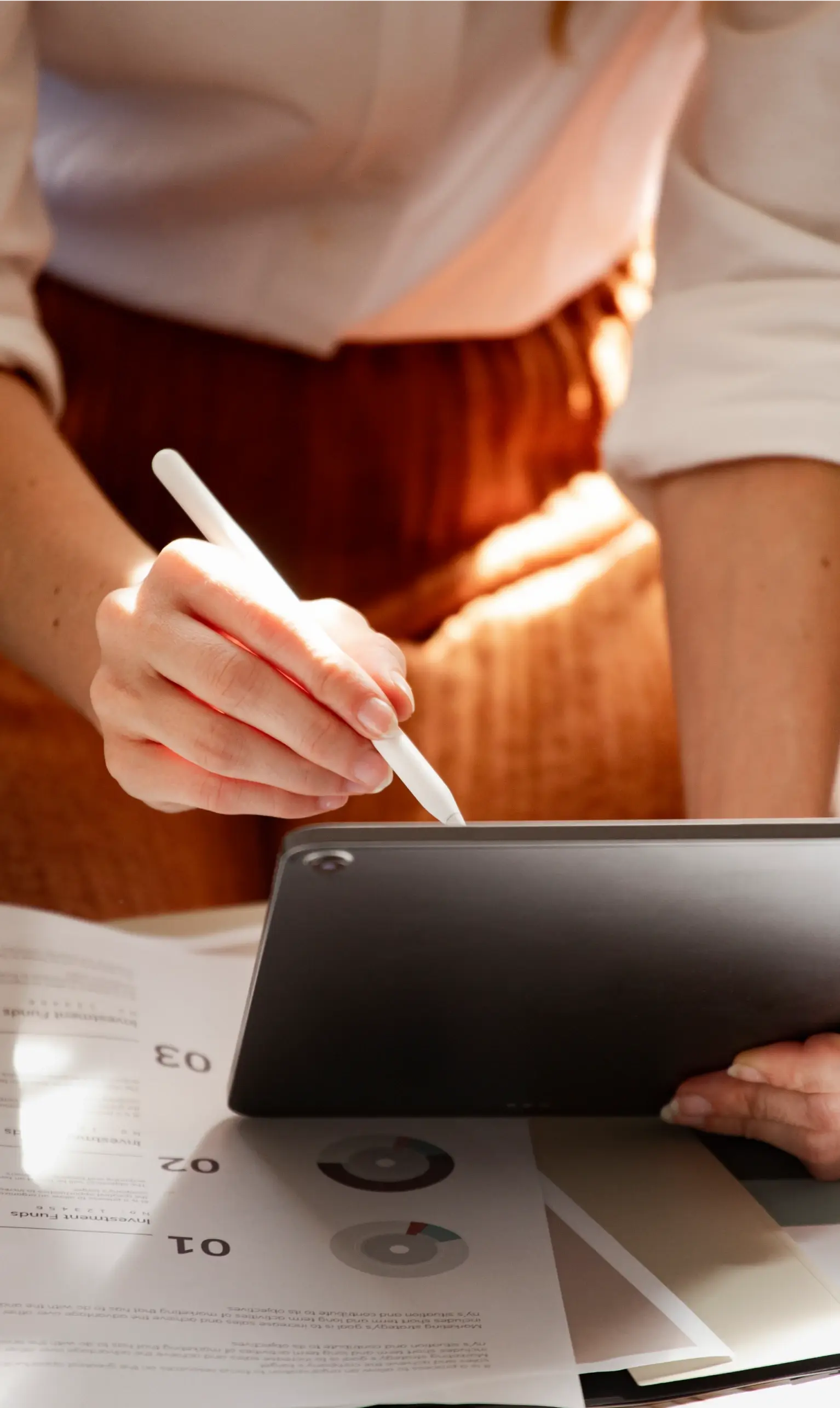 Fashion designer working on a digital tablet