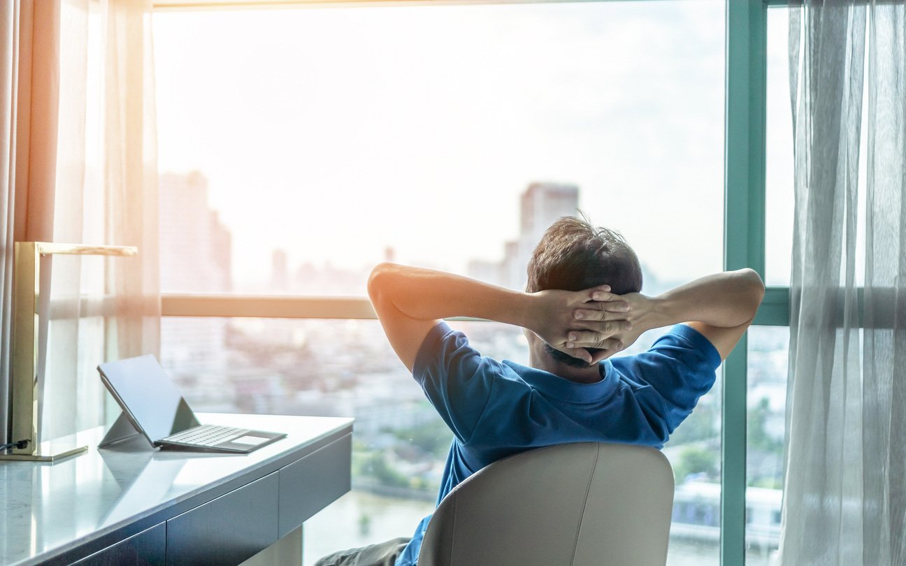 Person relaxing in a desk chair