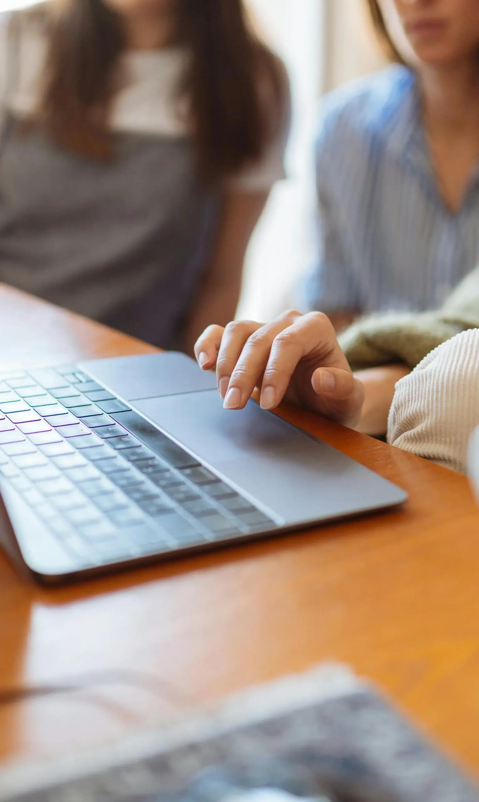 Women looking at a computer together