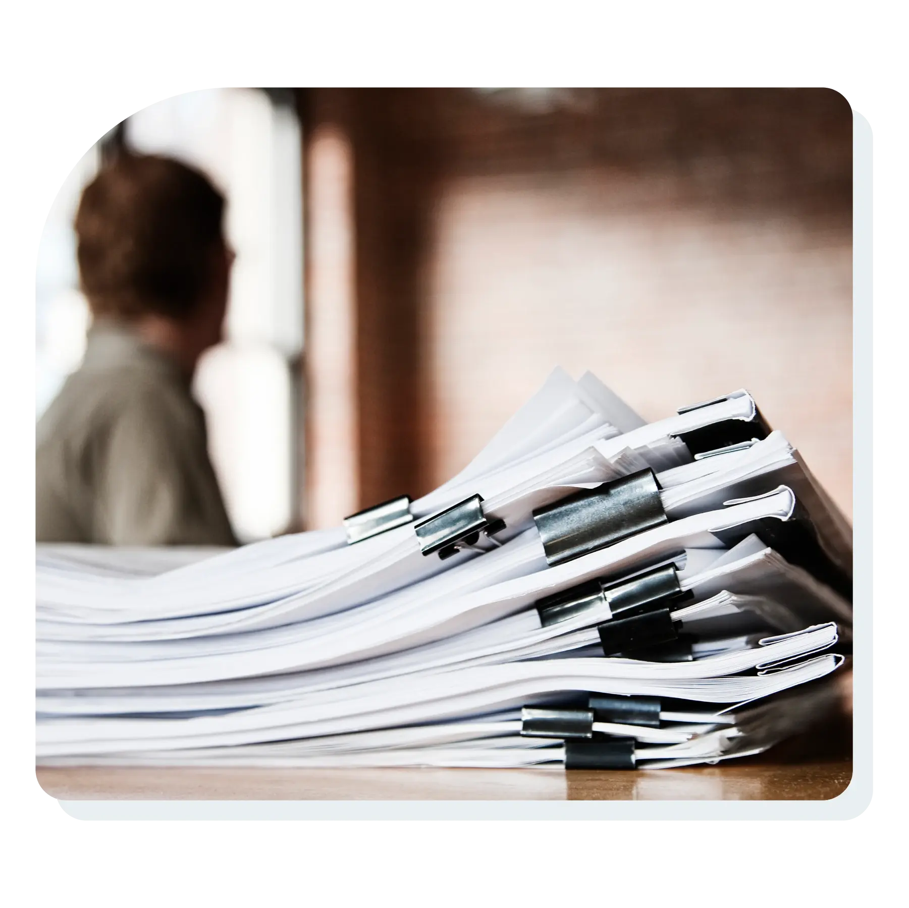 close_up_of_files_and_file_folders_on_a_desk_top_in_an_office_