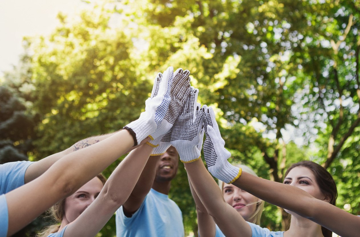 Photo of people giving a high five