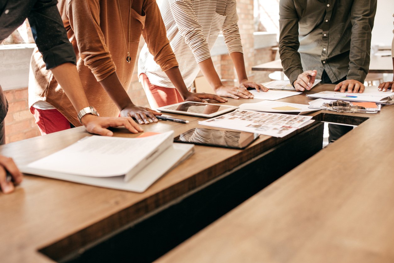 Image of people working at a desk