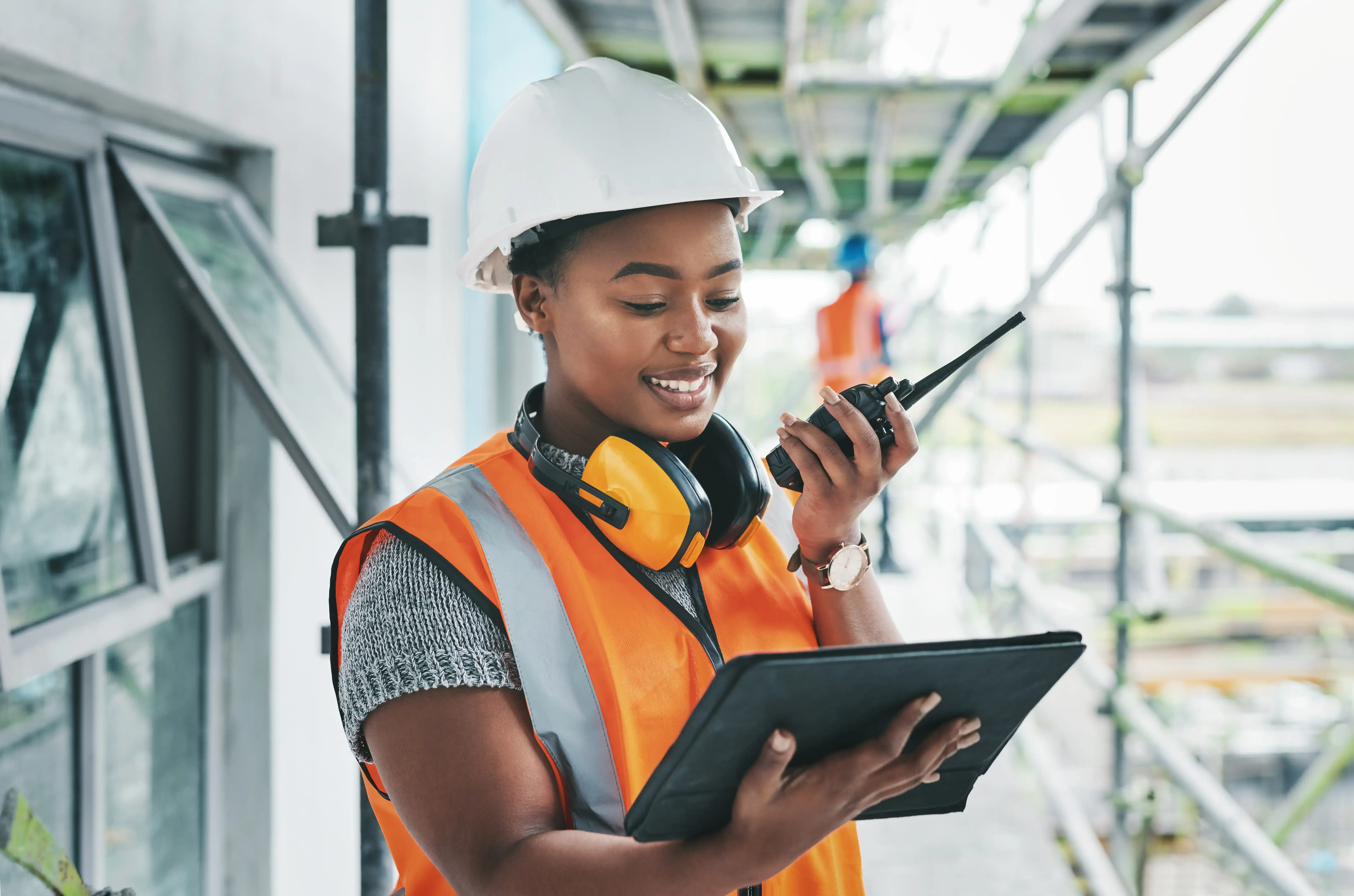 shot-of-a-young-woman-using-a-digital-tablet-and-w-2023-11-27-04-52-48-utc