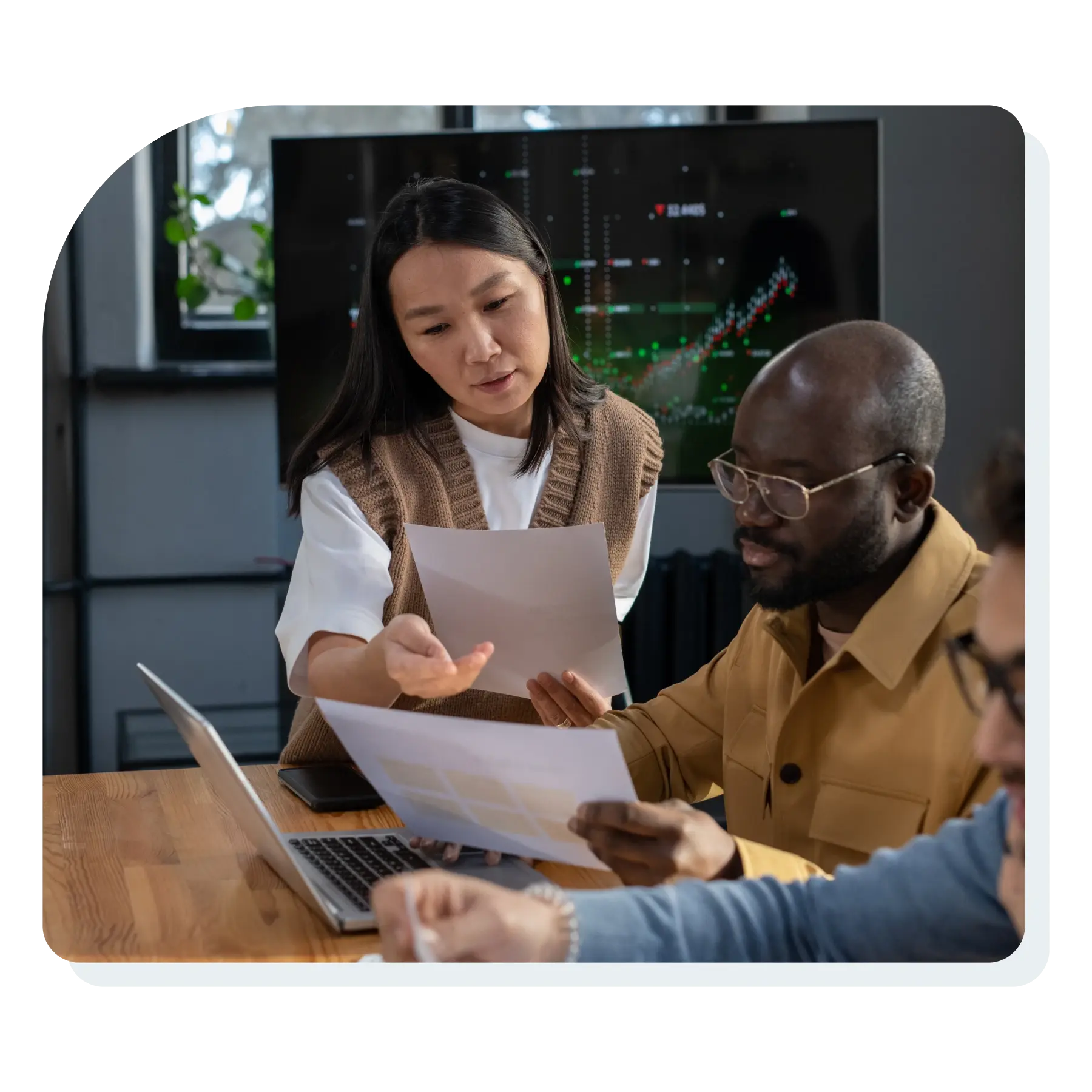 team_working_through_document_on_a_conference_table