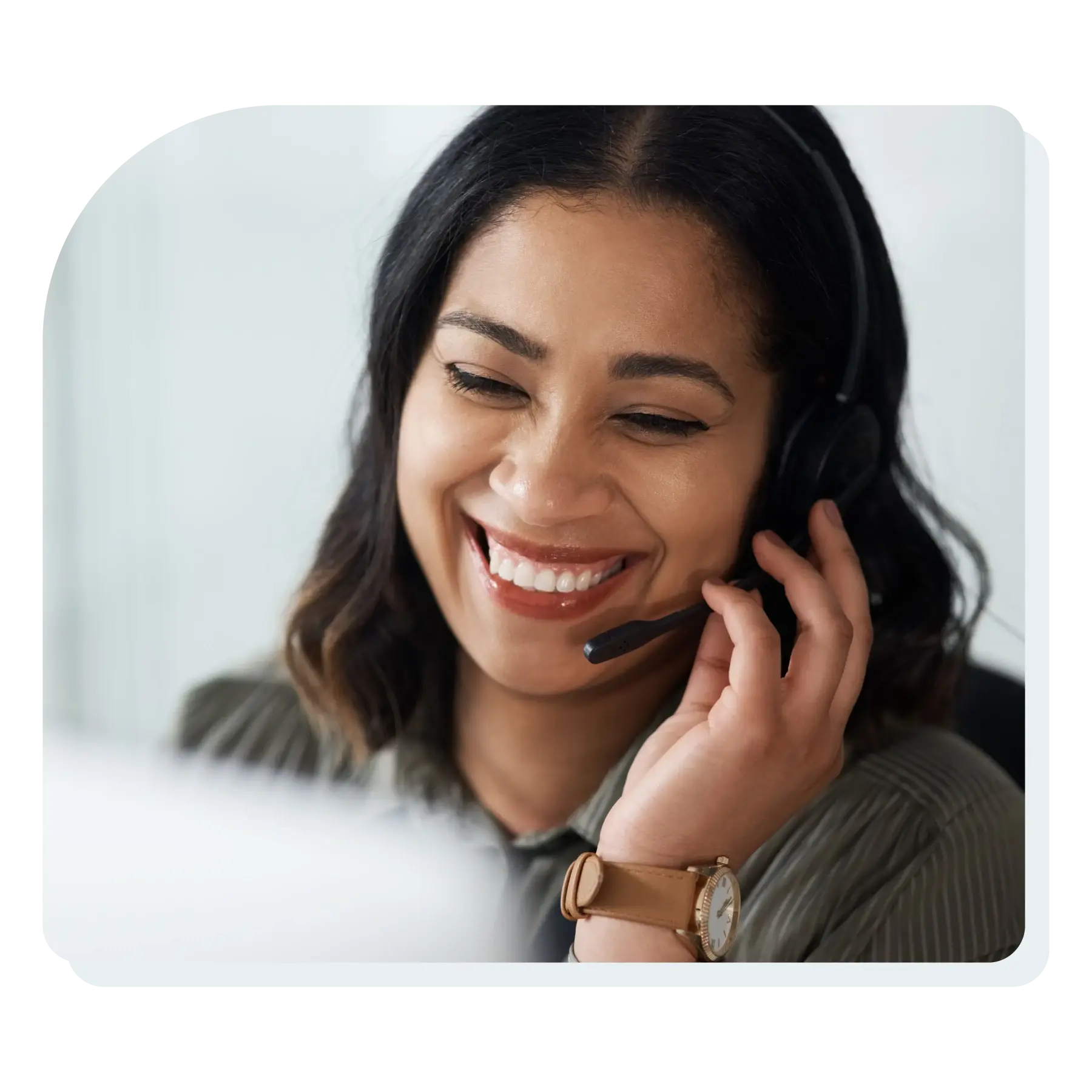 woman_smiling_on_the_phone_with_a_customer