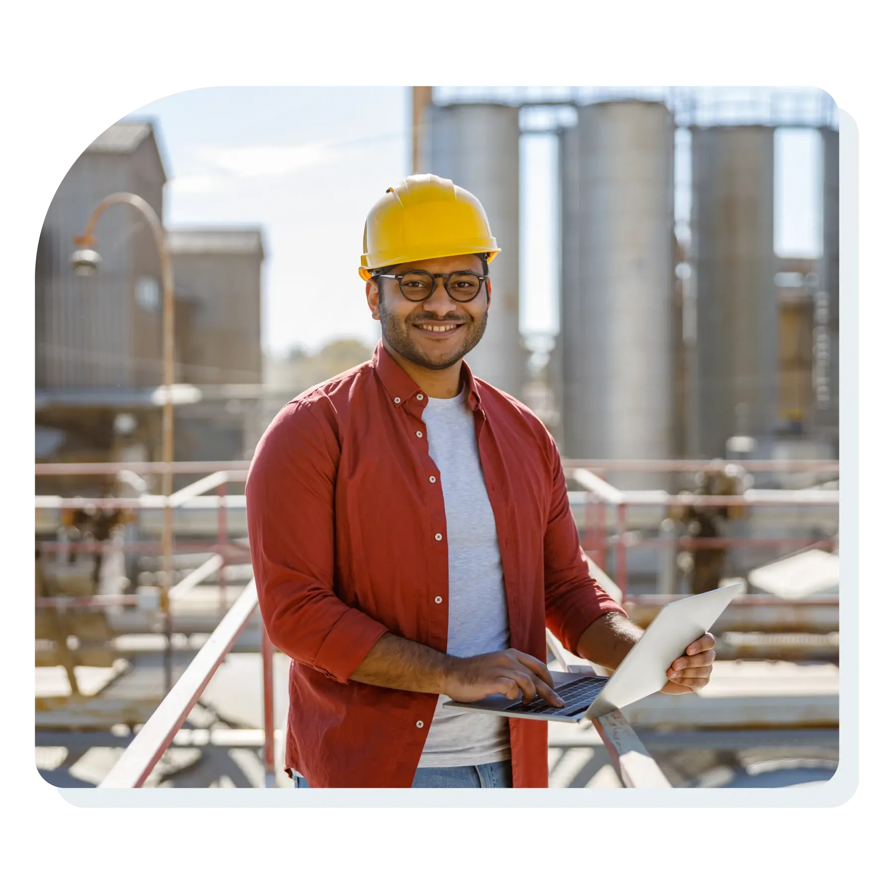 young_construction_specialist_working_at_industrial_plant